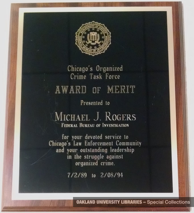 Award presented to Mike Rogers for his FBI service, 1989-1994