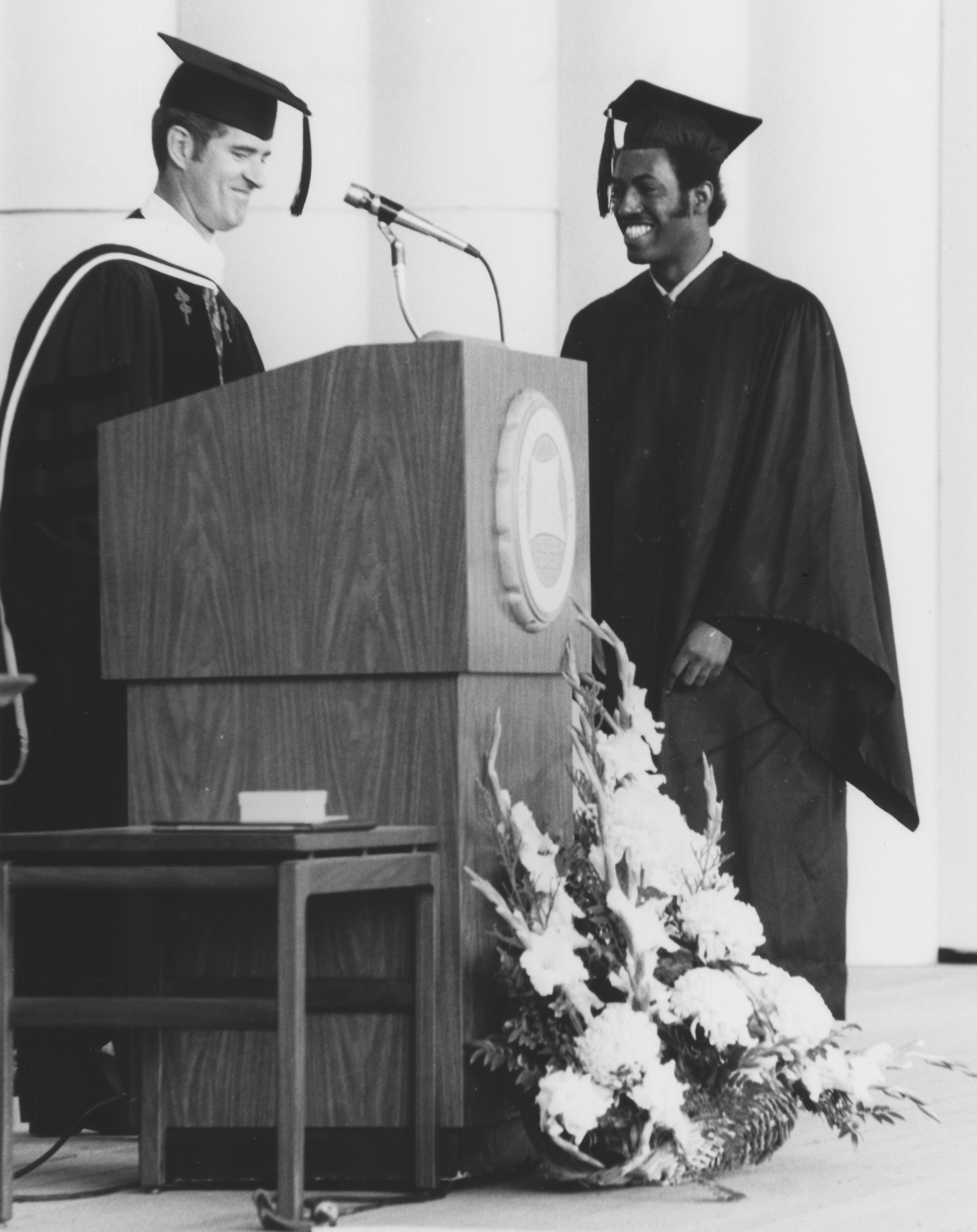 Earl Johnson receives his degree from President O'Dowd at Commencement