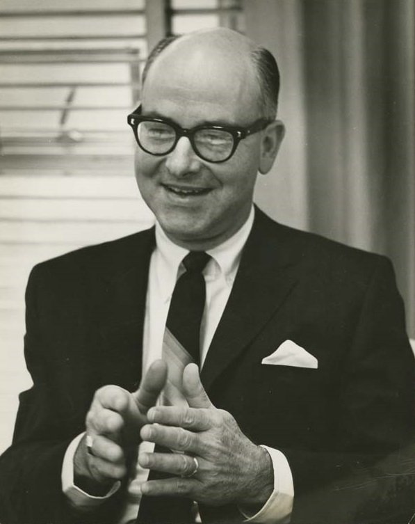 Black and white photograph of Woody Varner in a suit