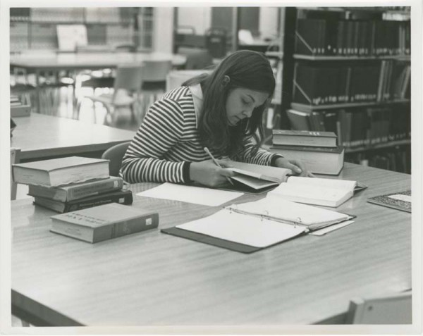 Female student studying at Kresge Library