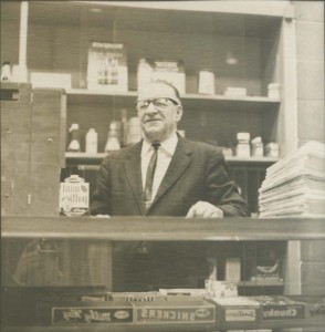 Edward "Charlie" Brown behind counter of Charlie Brown's