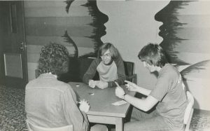 Students palying cards in the OC in the 1970s